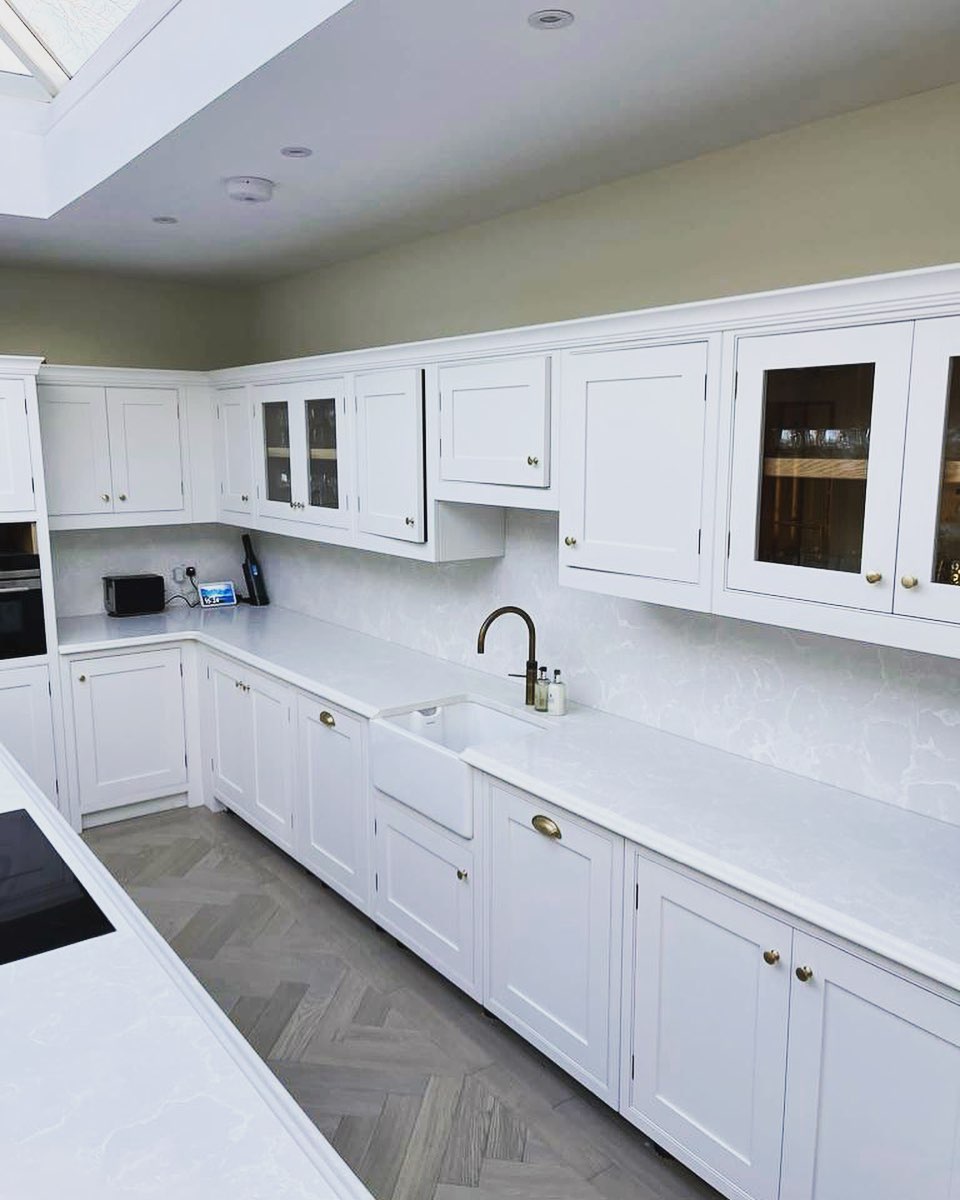 quartz worktops with kitchen sink and cupboards